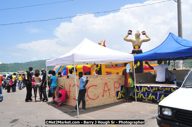 Lucea Cross the Harbour @ Lucea Car Park - All Day Event - Cross the Harbour Swim, Boat Rides, and Entertainment for the Family - Concert Featuring: Bushman, George Nooksl, Little Hero, Bushi One String, Dog Rice and many local Artists - Friday, August 1, 2008 - Lucea, Hanover Jamaica - Photographs by Net2Market.com - Barry J. Hough Sr. Photojournalist/Photograper - Photographs taken with a Nikon D300 - Negril Travel Guide, Negril Jamaica WI - http://www.negriltravelguide.com - info@negriltravelguide.com...!