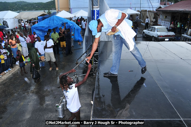 Lucea Cross the Harbour @ Lucea Car Park - All Day Event - Cross the Harbour Swim, Boat Rides, and Entertainment for the Family - Concert Featuring: Bushman, George Nooksl, Little Hero, Bushi One String, Dog Rice and many local Artists - Friday, August 1, 2008 - Lucea, Hanover Jamaica - Photographs by Net2Market.com - Barry J. Hough Sr. Photojournalist/Photograper - Photographs taken with a Nikon D300 - Negril Travel Guide, Negril Jamaica WI - http://www.negriltravelguide.com - info@negriltravelguide.com...!