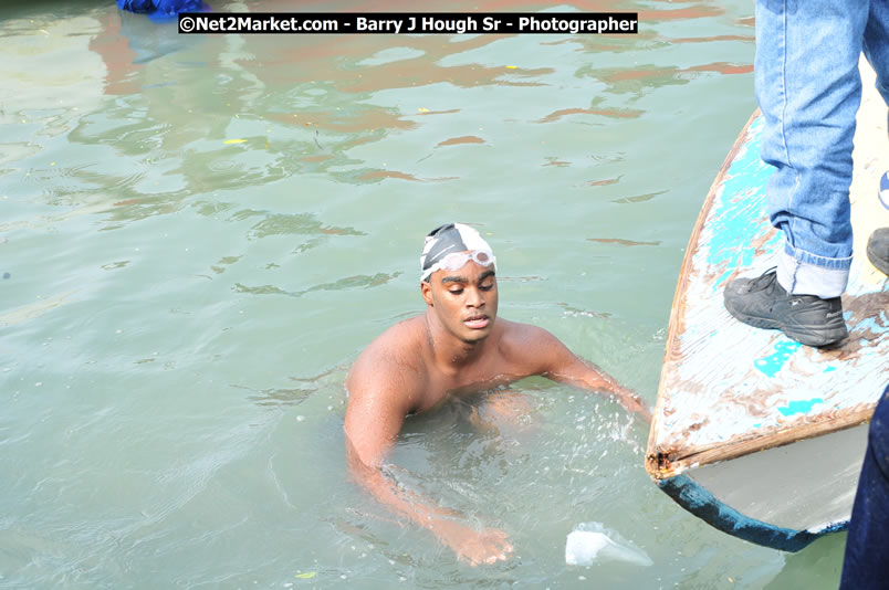 Lucea Cross the Harbour @ Lucea Car Park - All Day Event - Cross the Harbour Swim, Boat Rides, and Entertainment for the Family - Concert Featuring: Bushman, George Nooksl, Little Hero, Bushi One String, Dog Rice and many local Artists - Friday, August 1, 2008 - Lucea, Hanover Jamaica - Photographs by Net2Market.com - Barry J. Hough Sr. Photojournalist/Photograper - Photographs taken with a Nikon D300 - Negril Travel Guide, Negril Jamaica WI - http://www.negriltravelguide.com - info@negriltravelguide.com...!