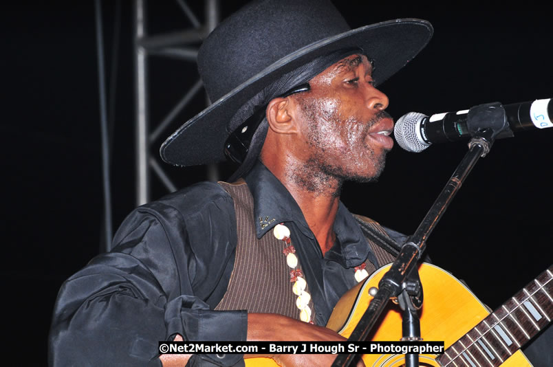 Lucea Cross the Harbour @ Lucea Car Park - All Day Event - Cross the Harbour Swim, Boat Rides, and Entertainment for the Family - Concert Featuring: Bushman, George Nooksl, Little Hero, Bushi One String, Dog Rice and many local Artists - Friday, August 1, 2008 - Lucea, Hanover Jamaica - Photographs by Net2Market.com - Barry J. Hough Sr. Photojournalist/Photograper - Photographs taken with a Nikon D300 - Negril Travel Guide, Negril Jamaica WI - http://www.negriltravelguide.com - info@negriltravelguide.com...!