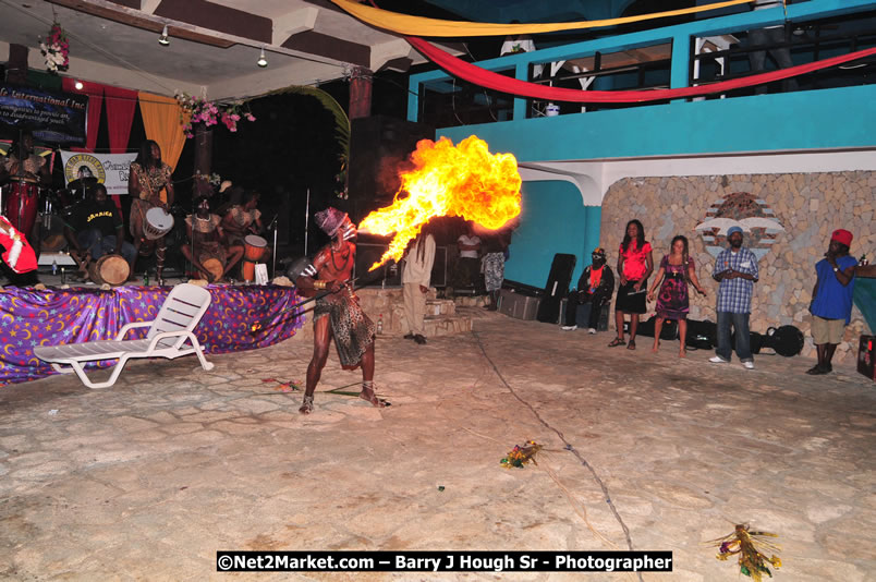 Chinese New Year @ The Sunset Show at Negril Escape - Tuesday, January 27, 2009 - Live Reggae Music at Negril Escape - Tuesday Nights 6:00PM to 10:00 PM - Photographs by Net2Market.com - Barry J. Hough Sr, Photographer/Photojournalist - Negril Travel Guide, Negril Jamaica WI - http://www.negriltravelguide.com - info@negriltravelguide.com...!