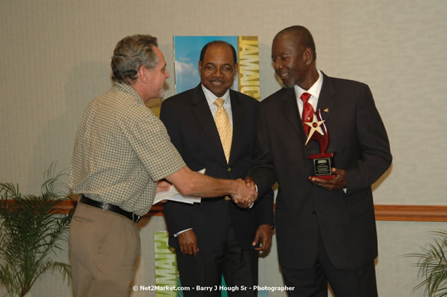 Red Cap Porters Awards - Minister of Tourism, Hon. Edmund Bartlett - Director of Tourism, Basil Smith - Friday, December 14, 2007 - Holiday Inn Sunspree, Montego Bay, Jamaica W.I. - Photographs by Net2Market.com - Barry J. Hough Sr, Photographer - Negril Travel Guide, Negril Jamaica WI - http://www.negriltravelguide.com - info@negriltravelguide.com...!