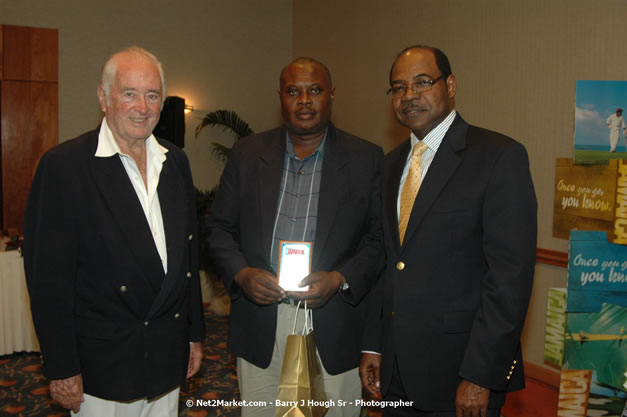 Red Cap Porters Awards - Minister of Tourism, Hon. Edmund Bartlett - Director of Tourism, Basil Smith - Friday, December 14, 2007 - Holiday Inn Sunspree, Montego Bay, Jamaica W.I. - Photographs by Net2Market.com - Barry J. Hough Sr, Photographer - Negril Travel Guide, Negril Jamaica WI - http://www.negriltravelguide.com - info@negriltravelguide.com...!