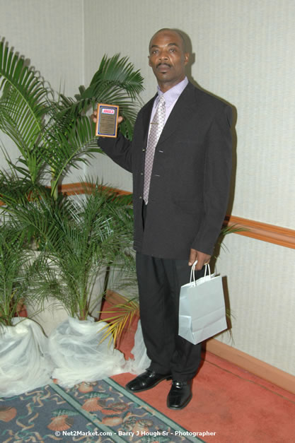 Red Cap Porters Awards - Minister of Tourism, Hon. Edmund Bartlett - Director of Tourism, Basil Smith - Friday, December 14, 2007 - Holiday Inn Sunspree, Montego Bay, Jamaica W.I. - Photographs by Net2Market.com - Barry J. Hough Sr, Photographer - Negril Travel Guide, Negril Jamaica WI - http://www.negriltravelguide.com - info@negriltravelguide.com...!