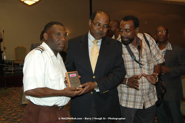 Red Cap Porters Awards - Minister of Tourism, Hon. Edmund Bartlett - Director of Tourism, Basil Smith - Friday, December 14, 2007 - Holiday Inn Sunspree, Montego Bay, Jamaica W.I. - Photographs by Net2Market.com - Barry J. Hough Sr, Photographer - Negril Travel Guide, Negril Jamaica WI - http://www.negriltravelguide.com - info@negriltravelguide.com...!