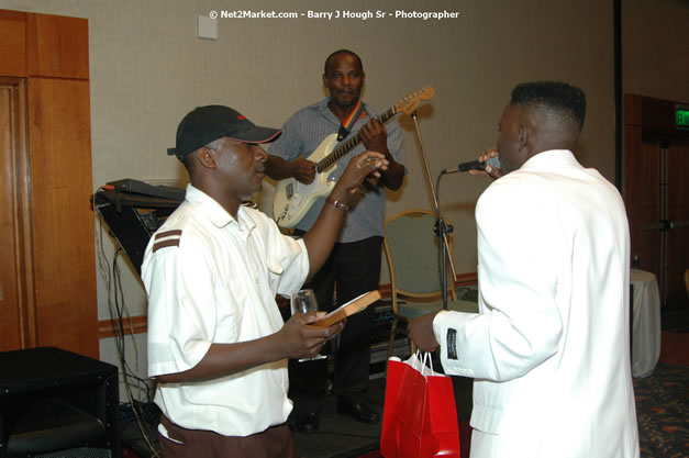 Red Cap Porters Awards - Minister of Tourism, Hon. Edmund Bartlett - Director of Tourism, Basil Smith - Friday, December 14, 2007 - Holiday Inn Sunspree, Montego Bay, Jamaica W.I. - Photographs by Net2Market.com - Barry J. Hough Sr, Photographer - Negril Travel Guide, Negril Jamaica WI - http://www.negriltravelguide.com - info@negriltravelguide.com...!