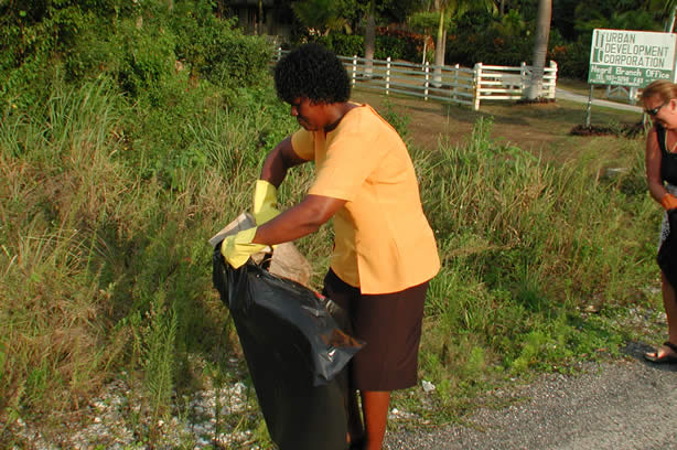 Volunteers Clean-Up Roadside Entrance to Negril - Negril Travel Guide