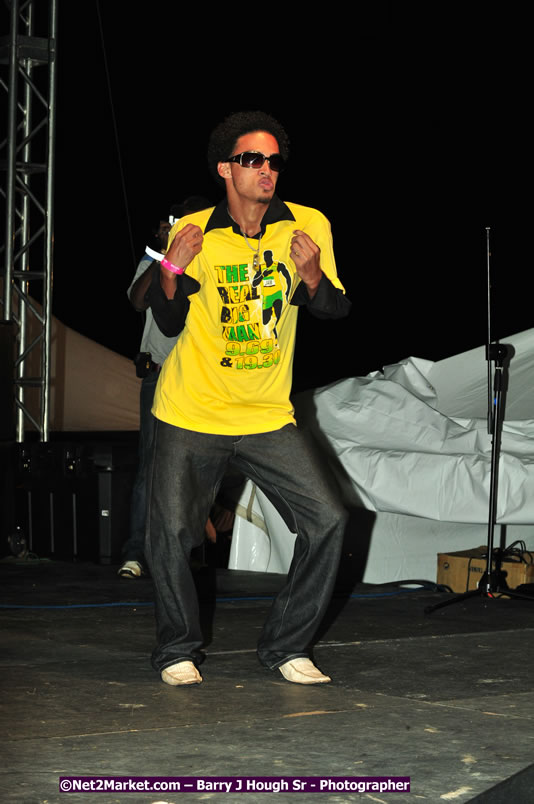 Usain Bolt of Jamaica - The Fastest Man In The World  - Usain Bolt Homecoming Celebrations Concert at the William Knibb High School Play Field, Trelawny - Ice, Ding Dong, Ravers Clavers, D'Angel, Voicemail, RDX and Dancers, Wayne Marshall, Tammi Chynn, Bugle, Nero, Tanya Stephens, Richie Spice, Kip Rich,and Shaggy - Photographs by Net2Market.com - Barry J. Hough Sr. Photojournalist/Photograper - Photographs taken with a Nikon D300 - Negril Travel Guide, Negril Jamaica WI - http://www.negriltravelguide.com - info@negriltravelguide.com...!