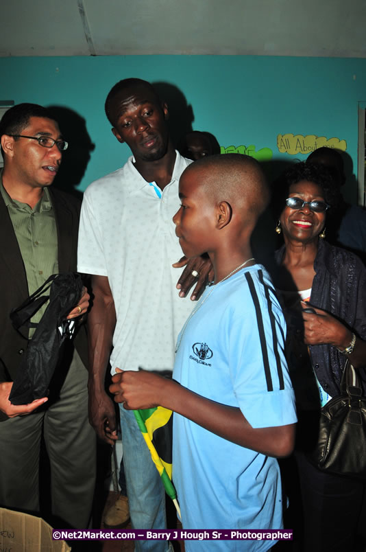 Usain Bolt of Jamaica - The Fastest Man In The World  - Usain Bolt Homecoming Celebrations - Press Conference at the Grand Bahia Principe &amp; Sherwood Content - Waldensia Primary School - Photographs by Net2Market.com - Barry J. Hough Sr. Photojournalist/Photograper - Photographs taken with a Nikon D300 - Negril Travel Guide, Negril Jamaica WI - http://www.negriltravelguide.com - info@negriltravelguide.com...!